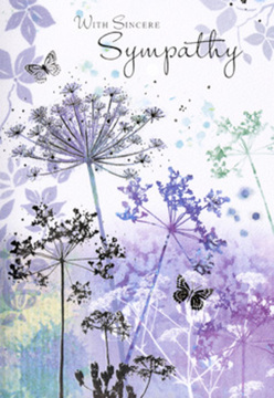 This sympathy card opens to reveal a gentle watercolour landscape where nature offers a quiet embrace. Tall, spidery stems of umbelliferous blooms rise from a soft ground of blended violets, muted purples, and cool silvery greens, much like the delicate wildflowers you might glimpse along a peaceful verge on the edge of Chessington. Each flower head forms a filigree cluster of tiny dots and lines, as if sketched carefully with a fine pen and then softened with a wash of colour. The petals and seed heads appear almost translucent at their tips, giving a sense of light filtering through morning mist. Drifting across this serene scene, semi-transparent butterflies float between the stems, their wings barely defined, as though caught mid-flight in a gentle breeze. The background fades into a hushed blur, with no strong outlines, just softened transitions that evoke reflection and calm. The overall mood is tender and contemplative, the way the air feels after a light rain has passed over Chessington's leafy streets. There is an understated sophistication in the composition, a respectfulness that never overwhelms but instead offers space for grief, memory, and quiet hope. As someone who arranges flowers for local funerals and memorials, I see in this design the same intention we bring to a condolence bouquet: to speak of care, presence, and compassion without a single word, making it an ideal accompaniment to a sympathy delivery sent to families throughout Chessington.